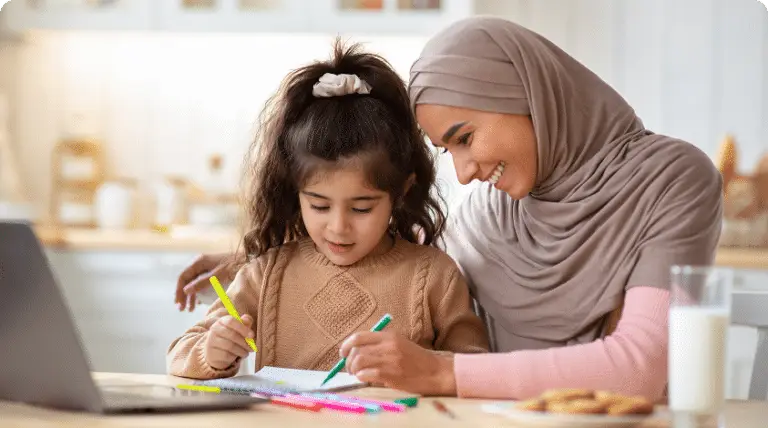 a Behavior Therapist and a child drawing